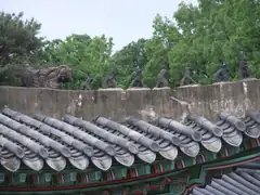 Creatures on pavilions roofs