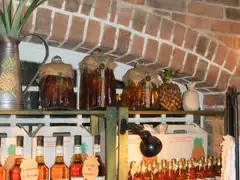 Pineapples for sale in various receptacles