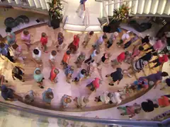 Line dancing in the atrium on Azura
