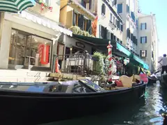 Gondola ride passing restaurant