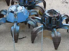 They resembled monstrous metal spiders